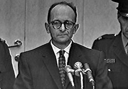 Eichmann standing in front of speaking podium