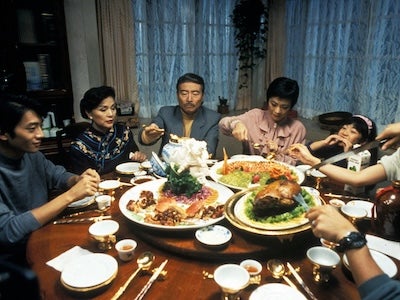 A family sharing an elaborate meal.