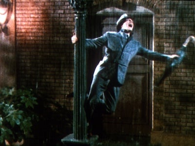 A man singing in the rain.