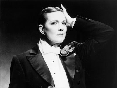 Julie Andrews wearing a tuxedo.