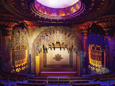 The interior of a movie palace.