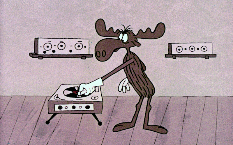 A cartoon moose using a record player.