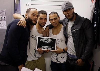 Conbody vs Everybody Four people posing for a photo.