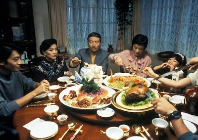 A family sharing an elaborate meal.