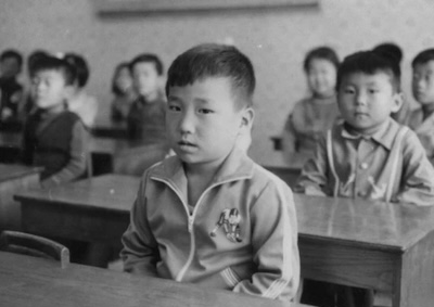 Homes Apart: Korea Young boys in a classroom