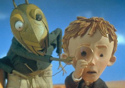 An animated grasshopper and a boy looking through a monocle.