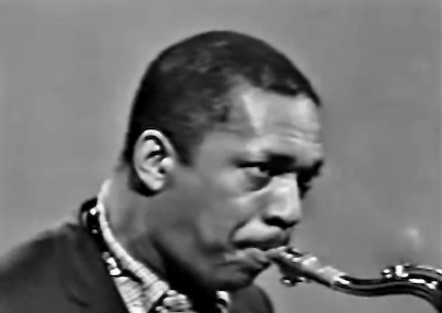 John Coltrane playing the saxophone.