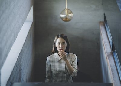 Parasite A woman gasping.