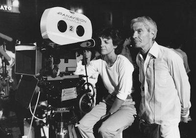 Agnès Godard behind a movie camera.