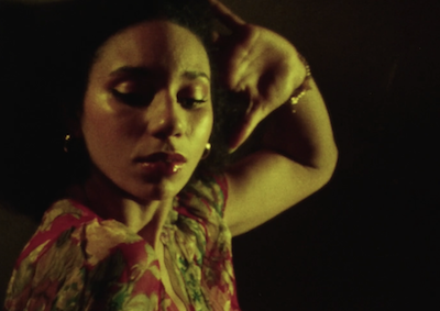 Closeup of a woman dancing.