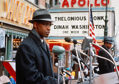 Denzel Washington as Malcolm X outside the Apollo Theatre.