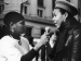A person being interviewed on the street.