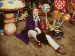 Willy Wonka among oversized candies and mushrooms.