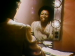 Betty Carter smiling in the mirror