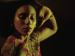 Closeup of a woman dancing.